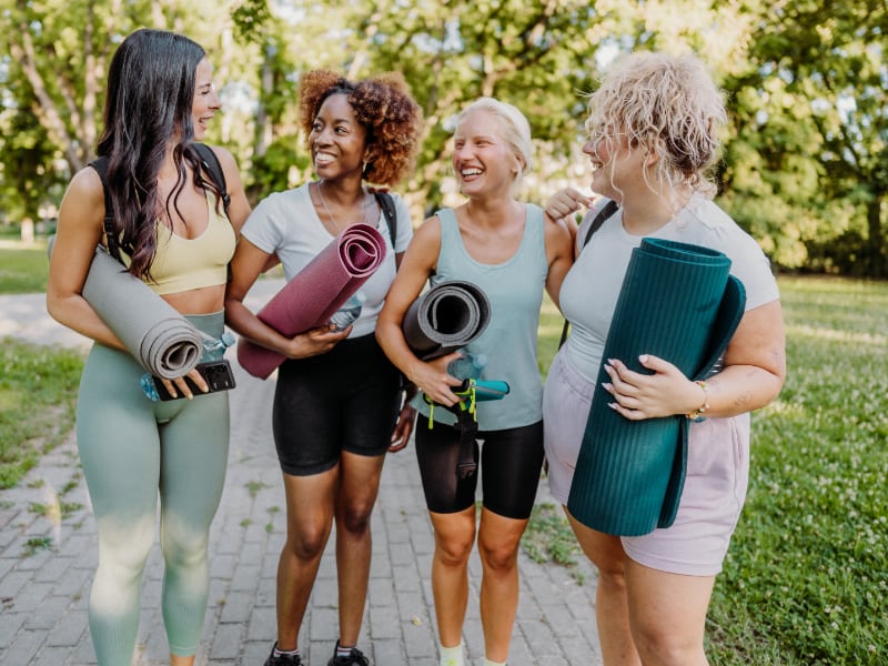 A group of women going to their yoga class
