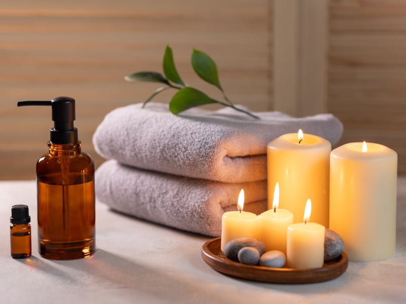 Candles and folded towels at a spa